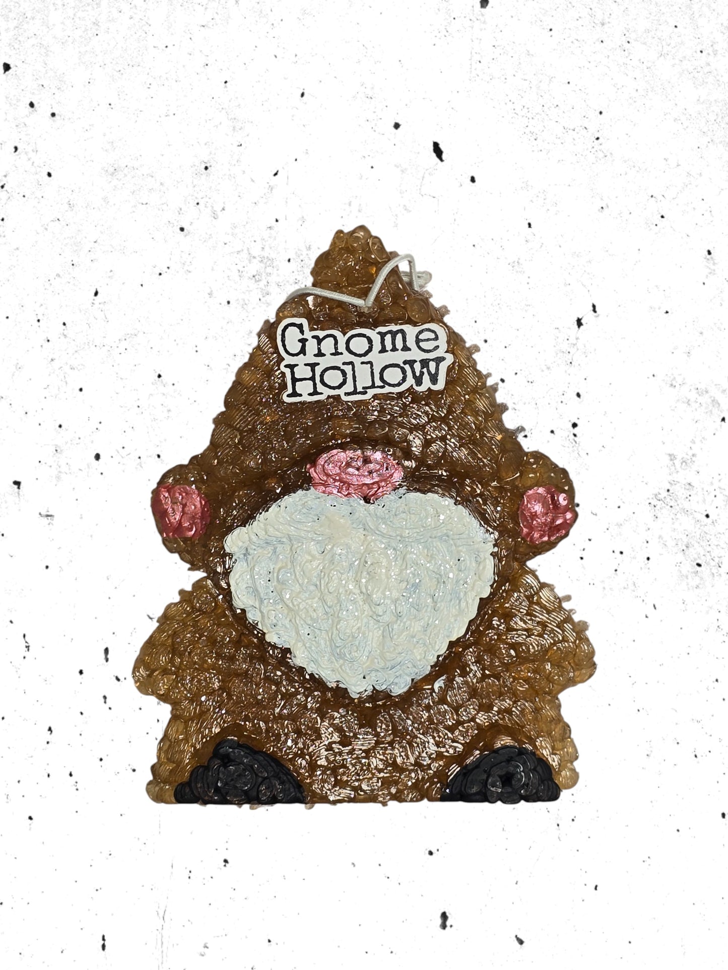 Brown gnome with a white speckled background
