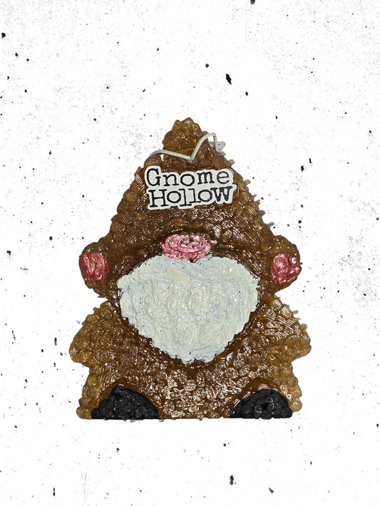 Brown gnome with a white speckled background