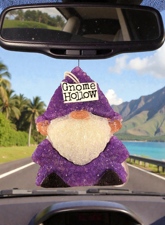 Gnome Hollow air freshener hanging from rear view mirror