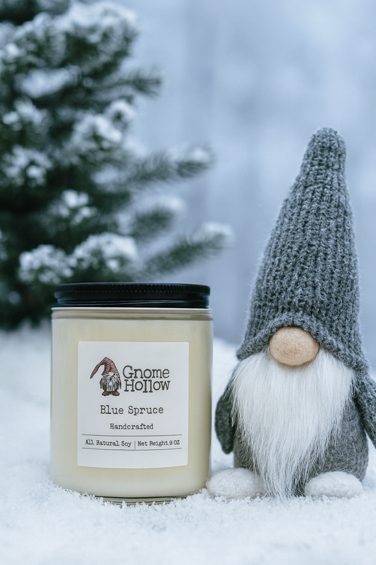 Gnome Hollow candle with a gnome figure in the snow