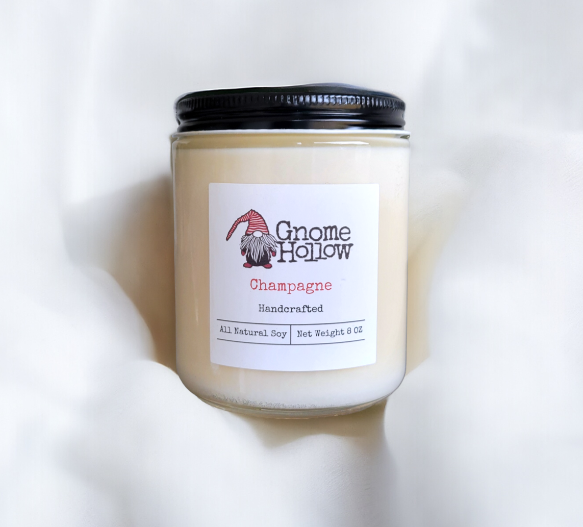 A Champagne soy candle wrapped in a white cloth