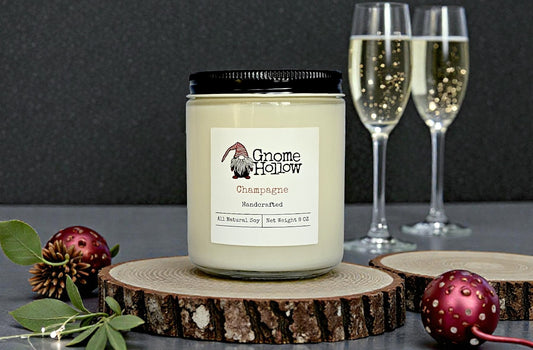 candle with champagne glasses