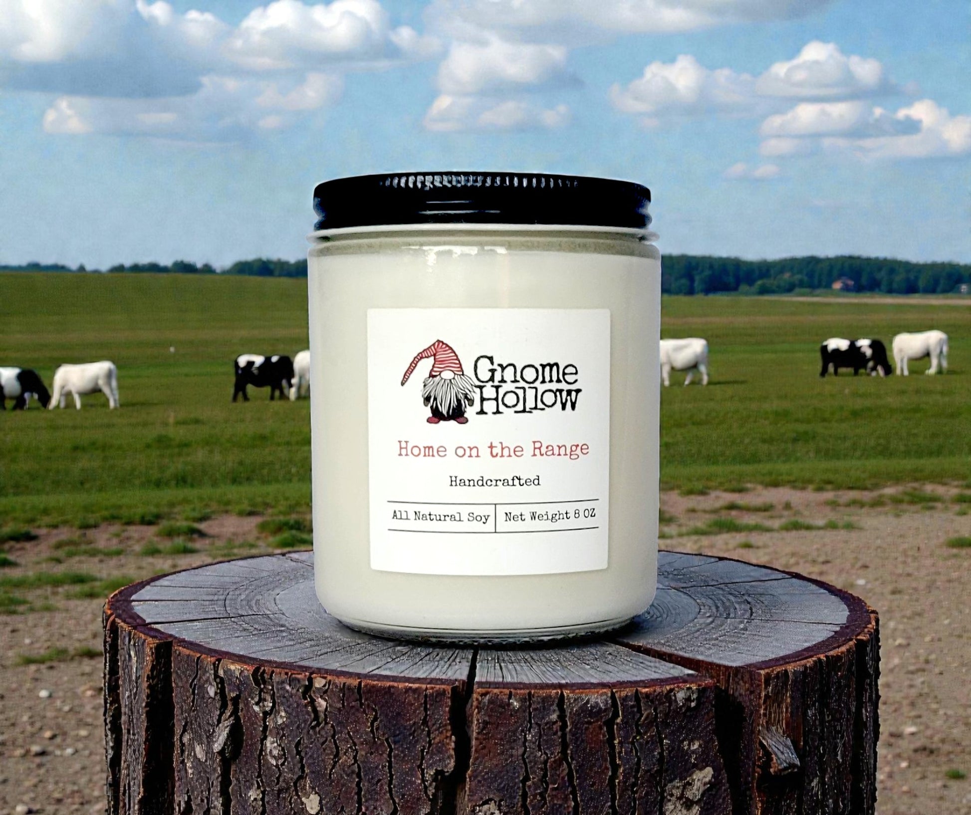 Candle with pasture in the background
