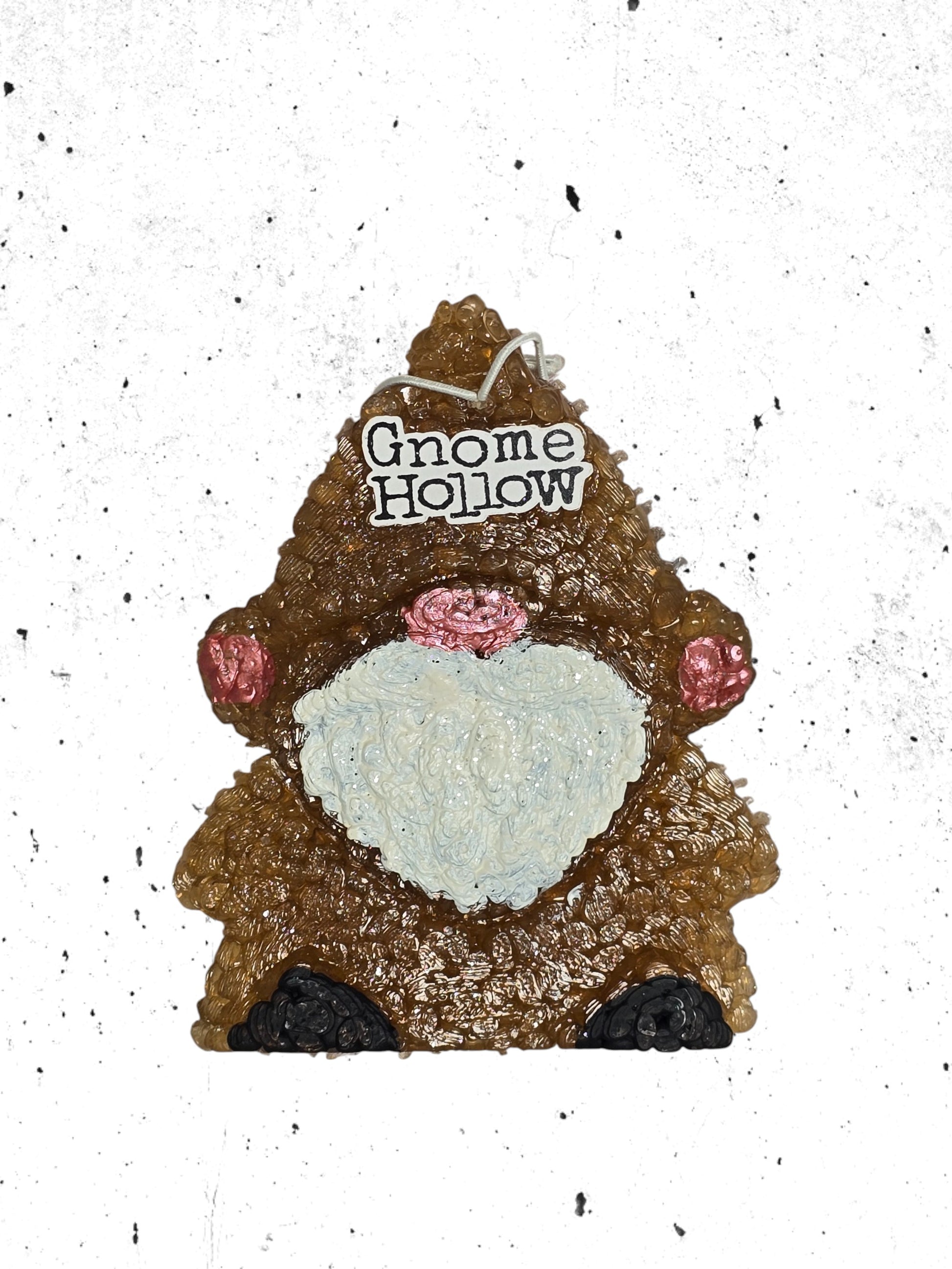 Brown gnome with a white speckled background