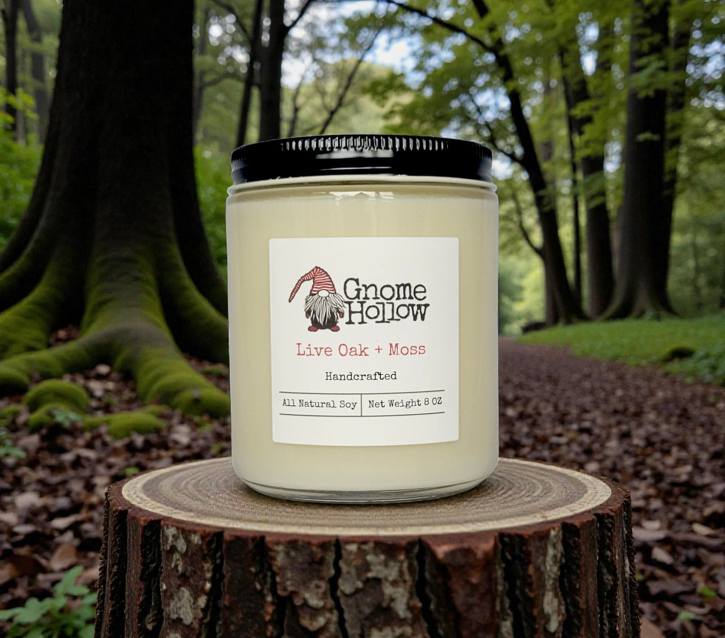 Candle surrounded by mossy oak trees