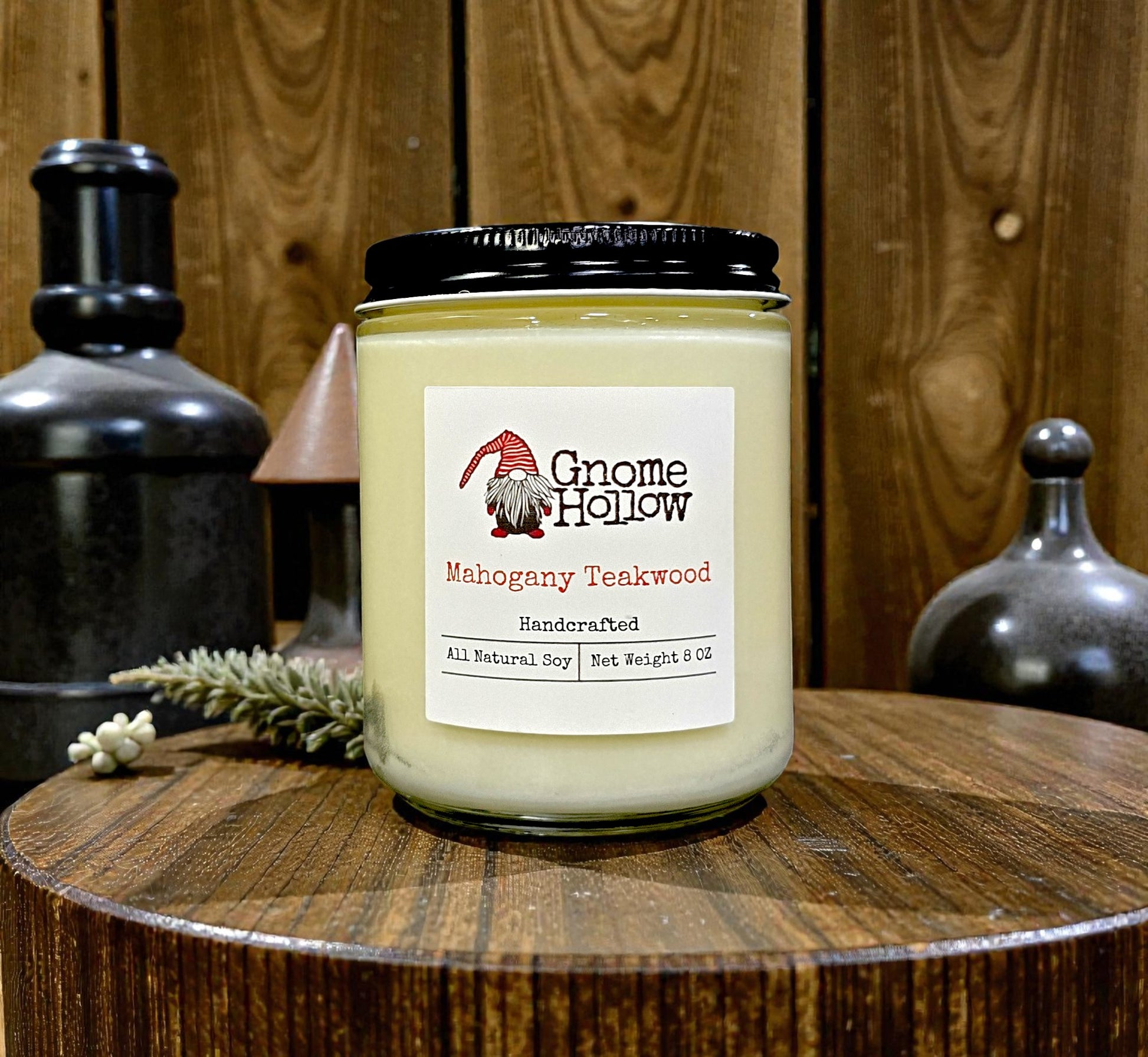 Candle on a round wood table