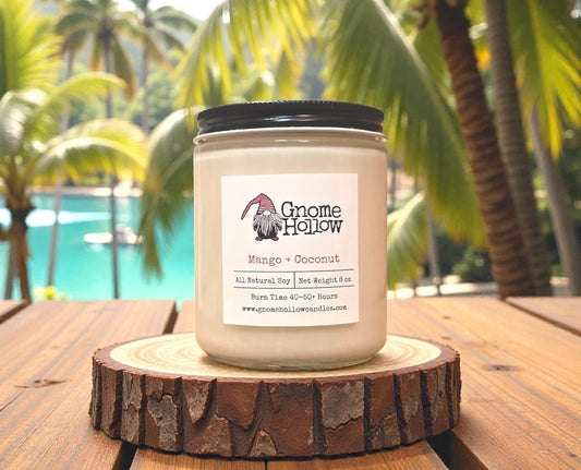 Candle on a wood piece with palm trees in the background