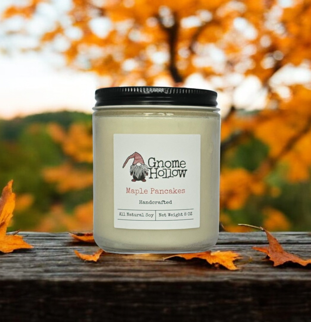 Maple Pancakes candle with a fall foliage background