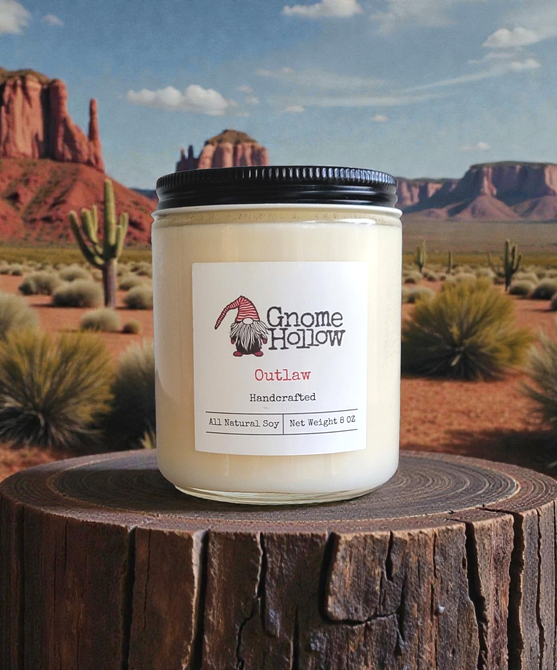 Candle with mountains & desert in background