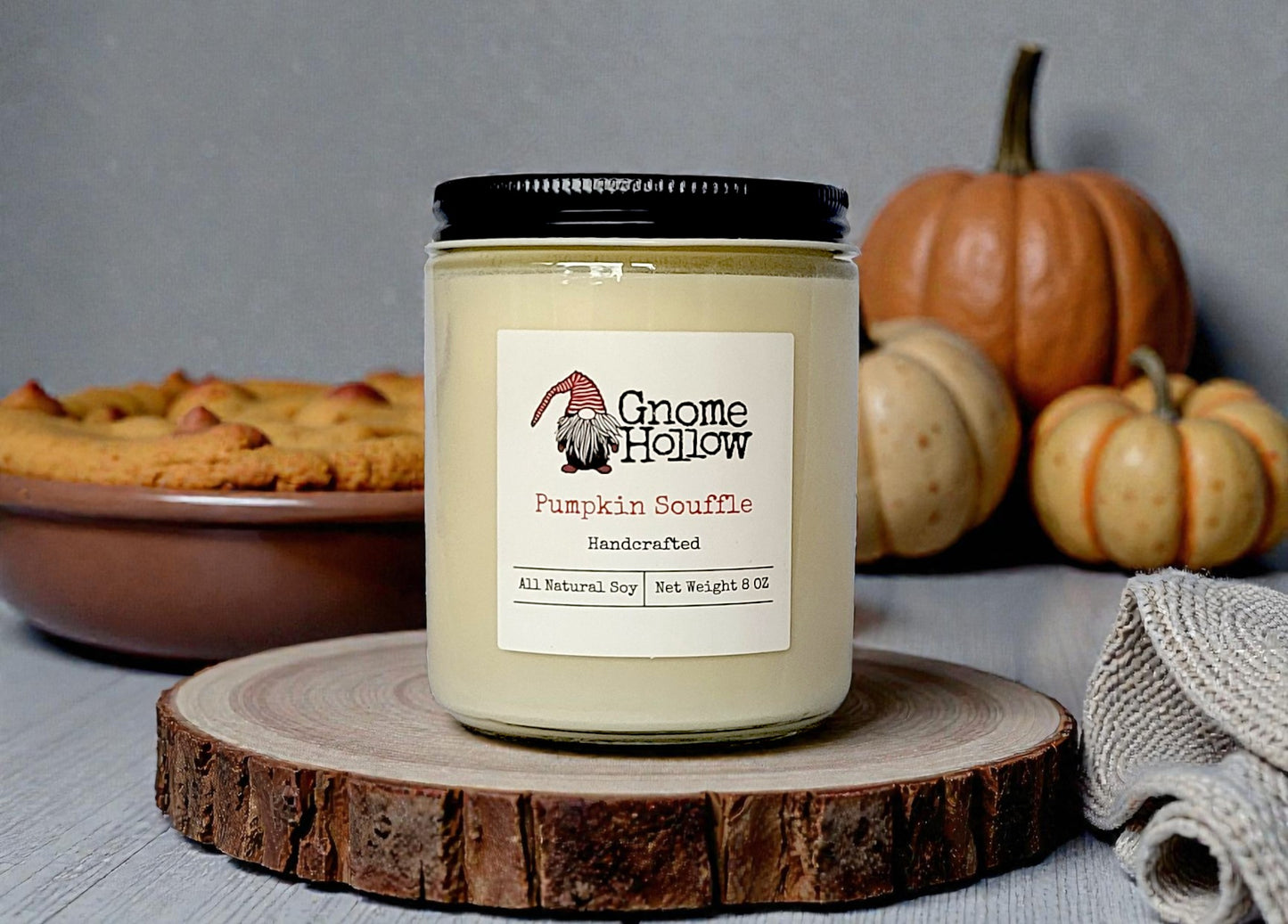 Candle in front of pies