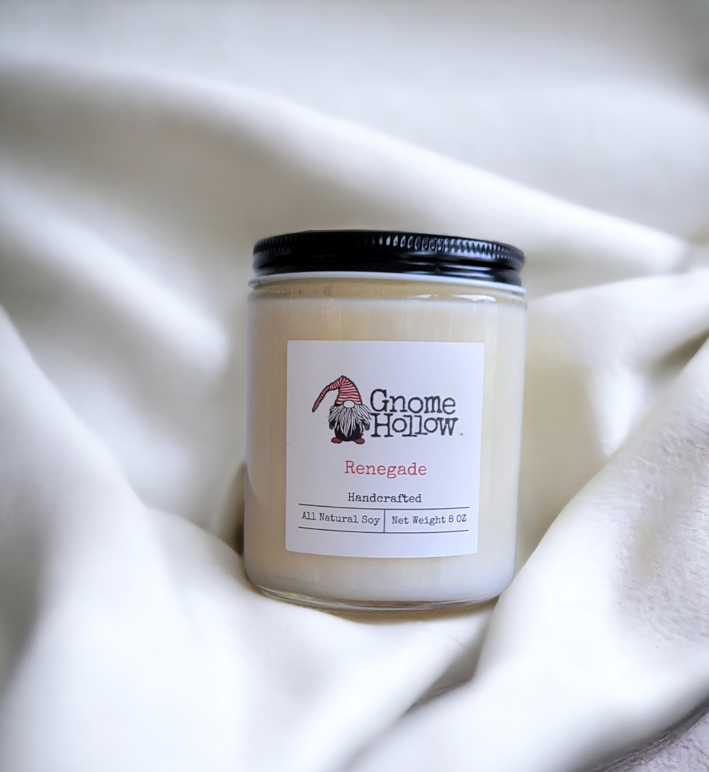 Renegade candle wrapped in a white cloth