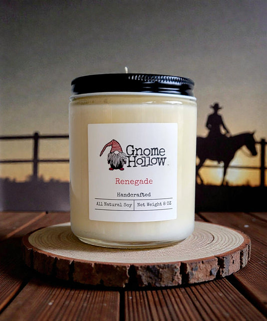 Candle with a sunset and cowboy in background