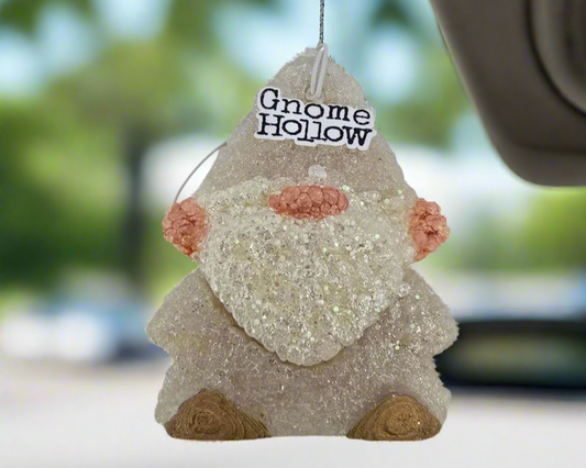 Vanilla Buttercream air freshener dangling from a rear view mirror