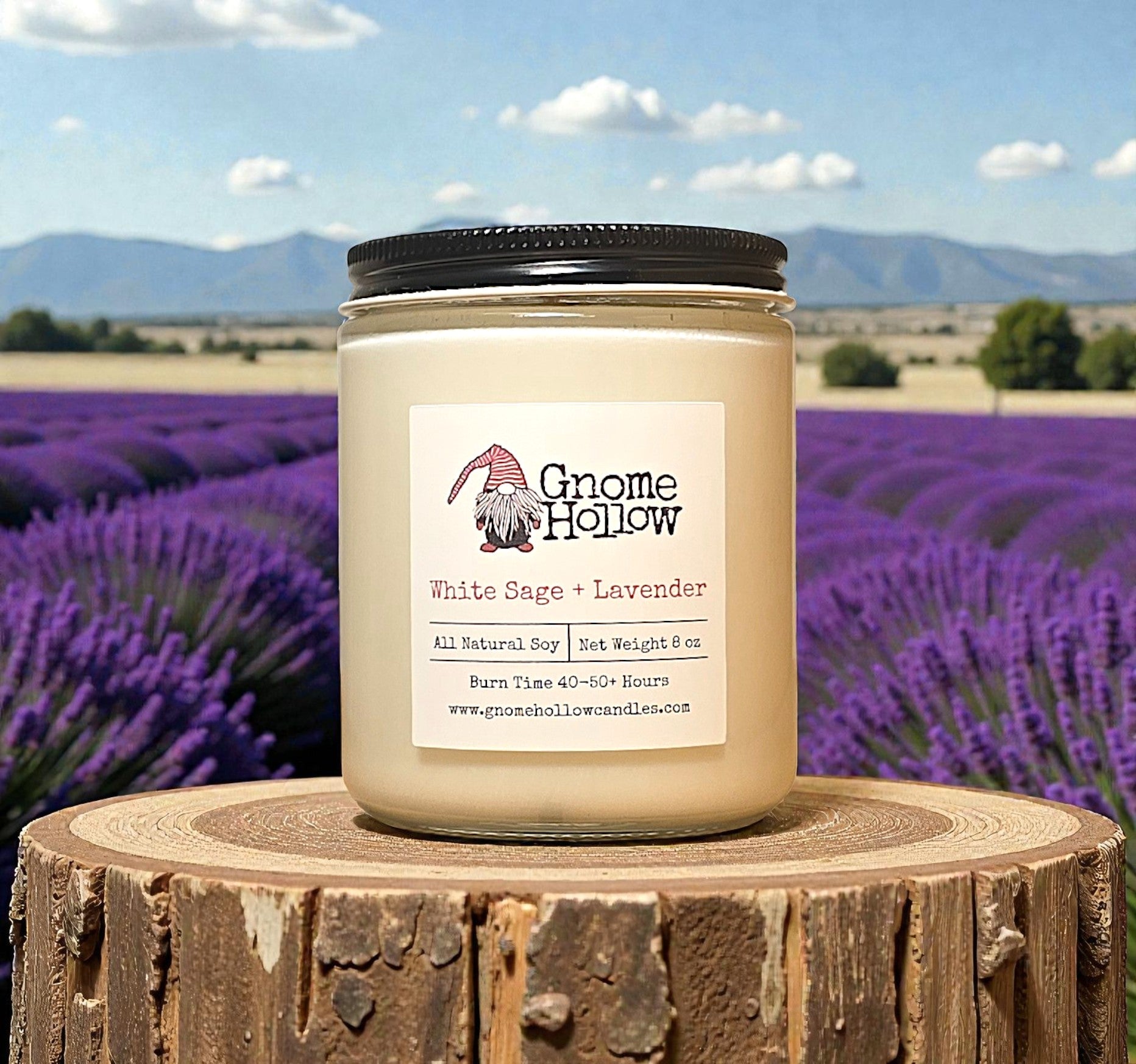 Candle on a piece of wood with lavender in the background