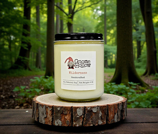 Candle with Wilderness in the background