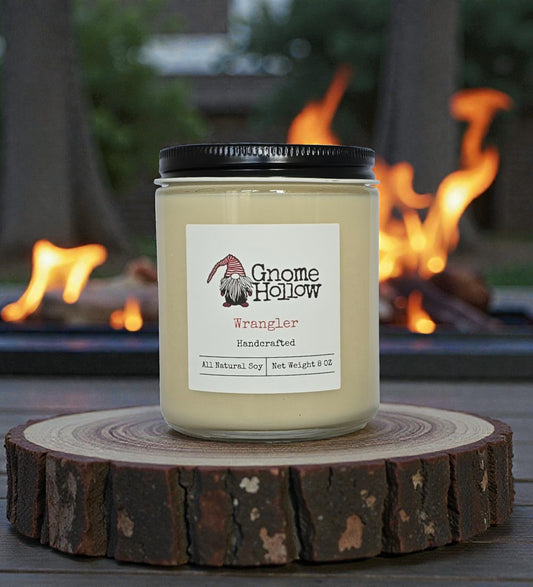 Candle in front of a fire pit